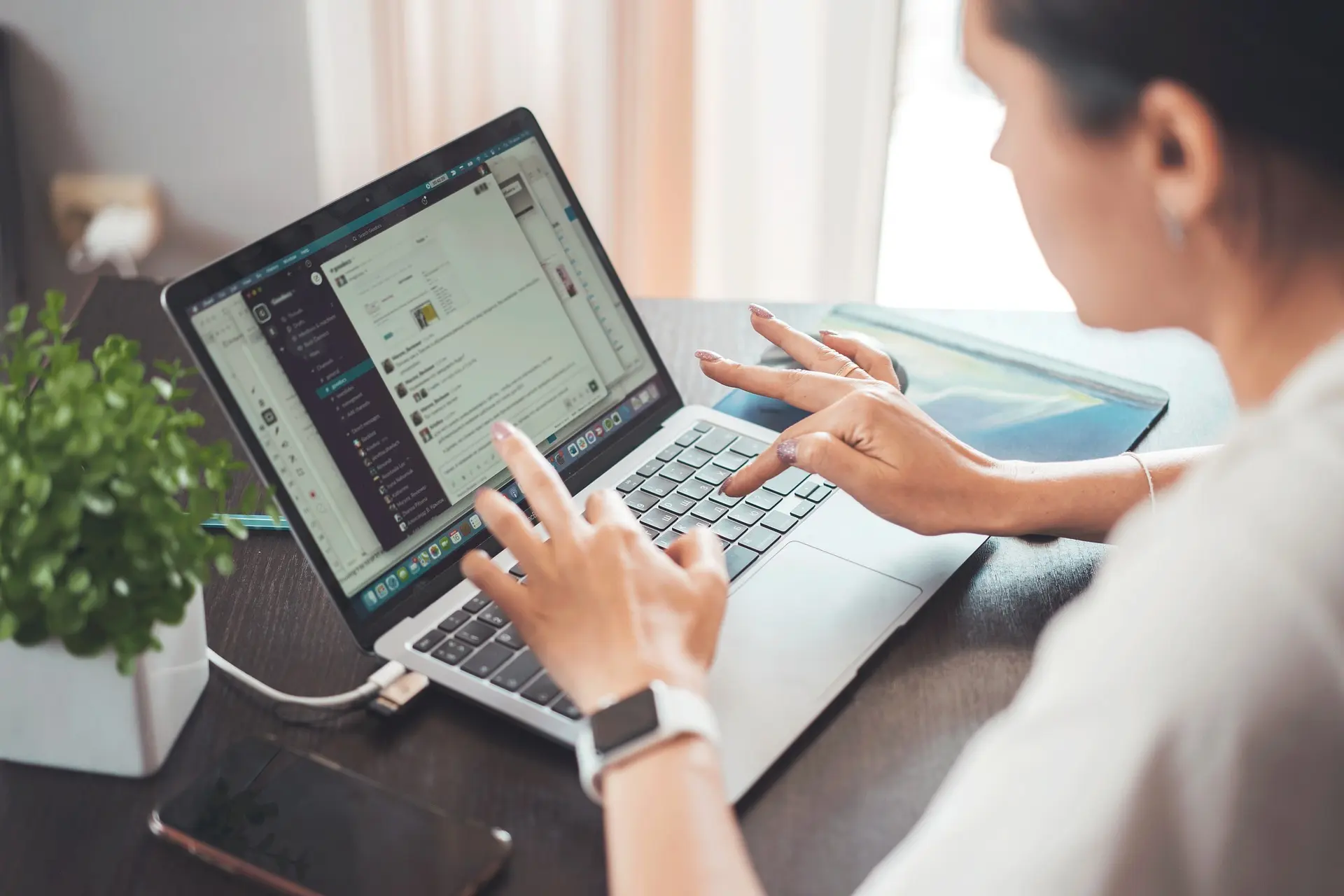 A woman working on her computer